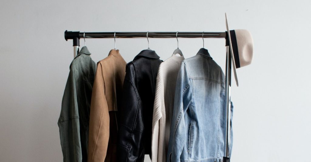 Clothes Rail with Denim Jacket, Leather Jacket, Jumper and Hat | Swap, borrow and rent | Tips for a greener wardrobe