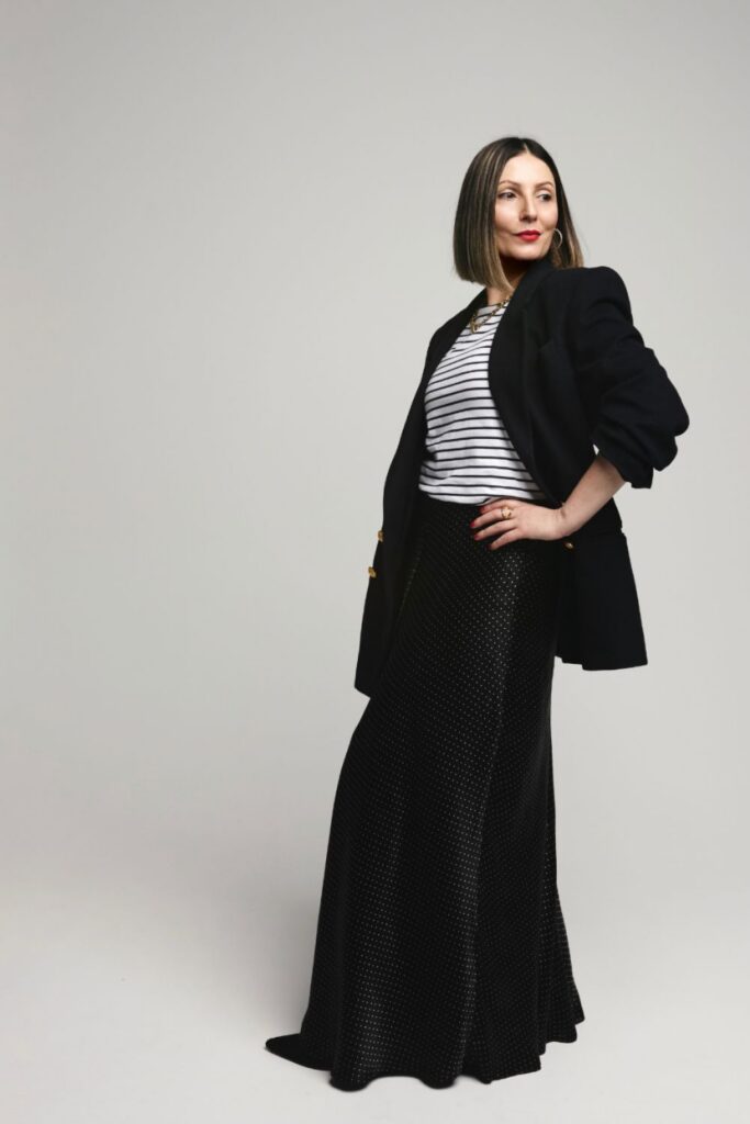 Roberta Lee wearing IVY Dotty V Fine Stripe Tee with blazer – sustainable styling by The Sustainable Stylist