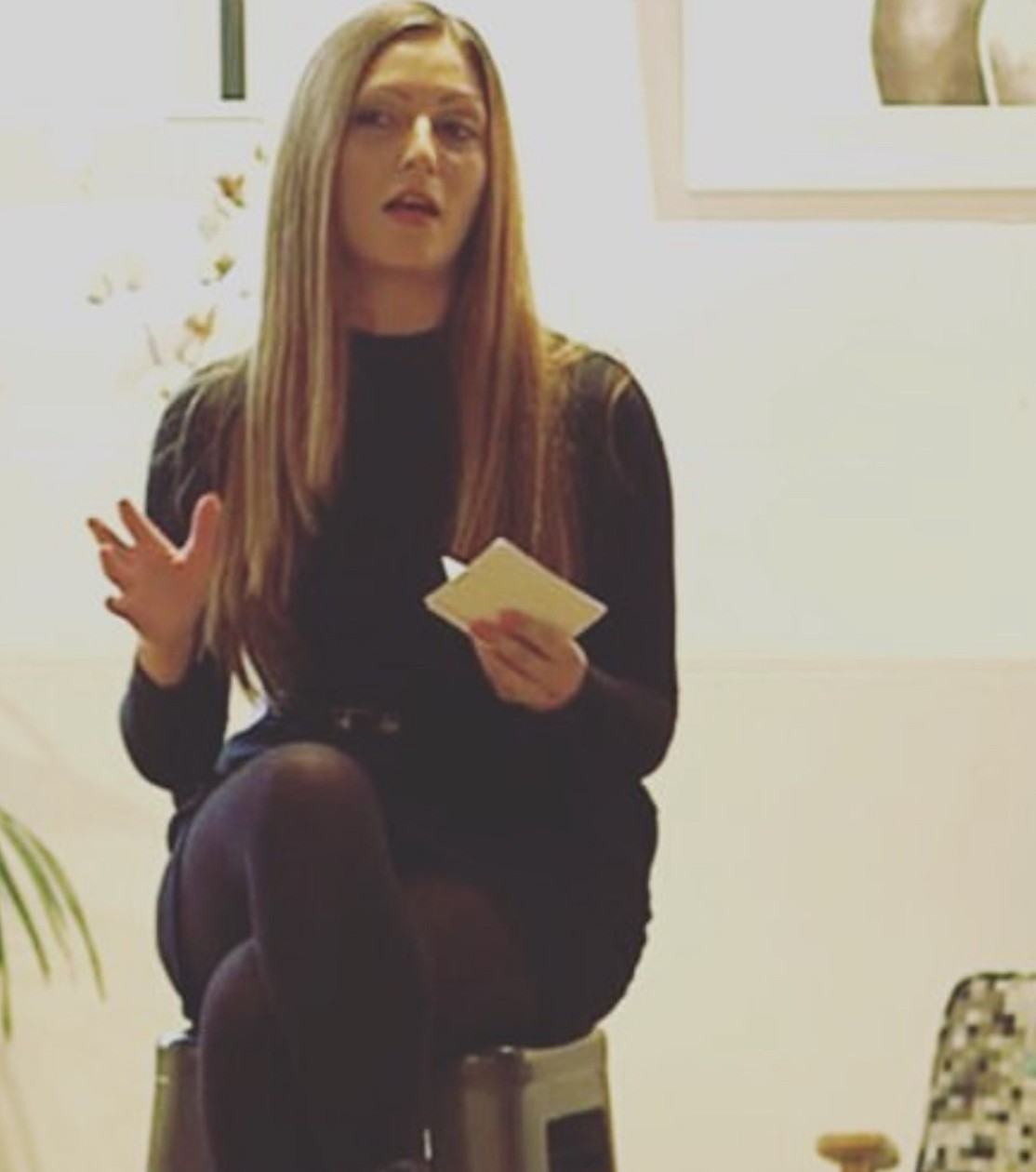 Seated speaker gesturing