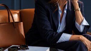 Women wearing premium luxury brands without loud logos, minimalist, timeless style, modern style - sits wondering about the definition of luxury and how to embrace luxury sustainably.